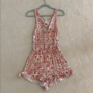 Coral geometric print romper